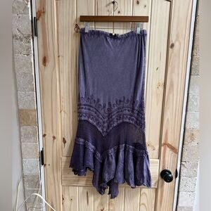 Vintage bohemian-style midi skirt, intricate embroidery, tiered asymmetrical hem